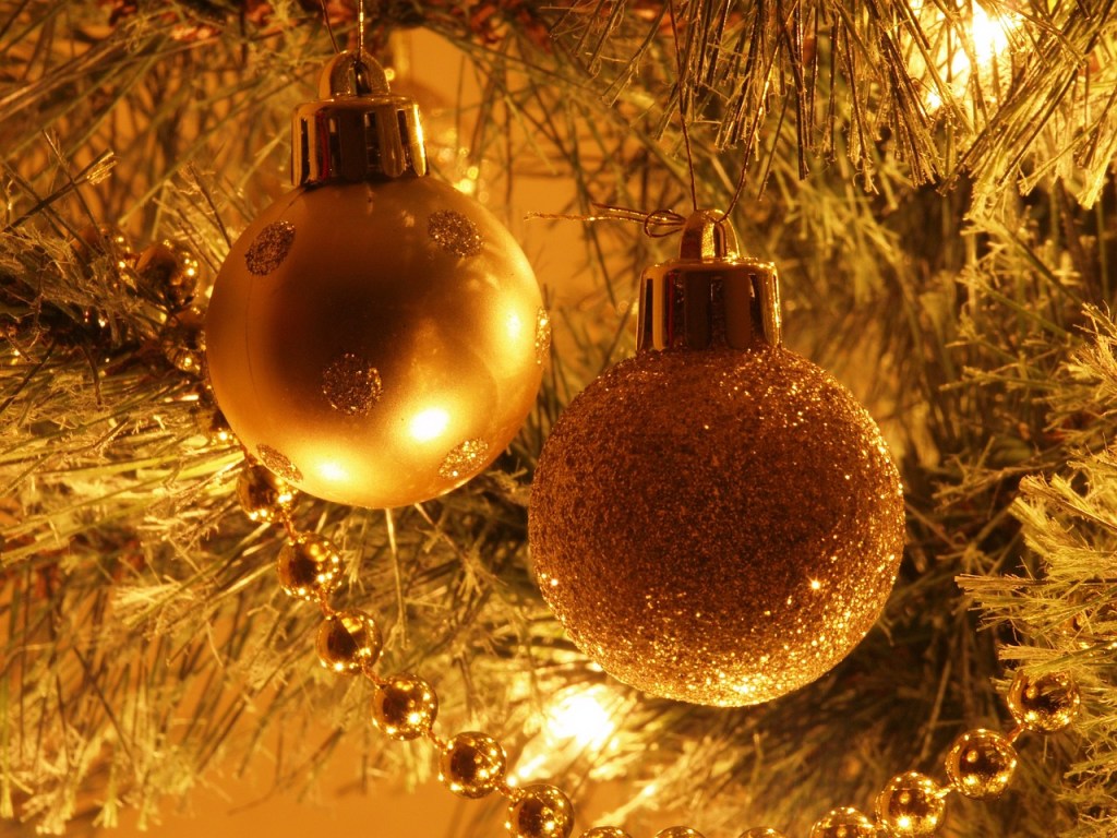 golden baubles on a gold Christmas tree