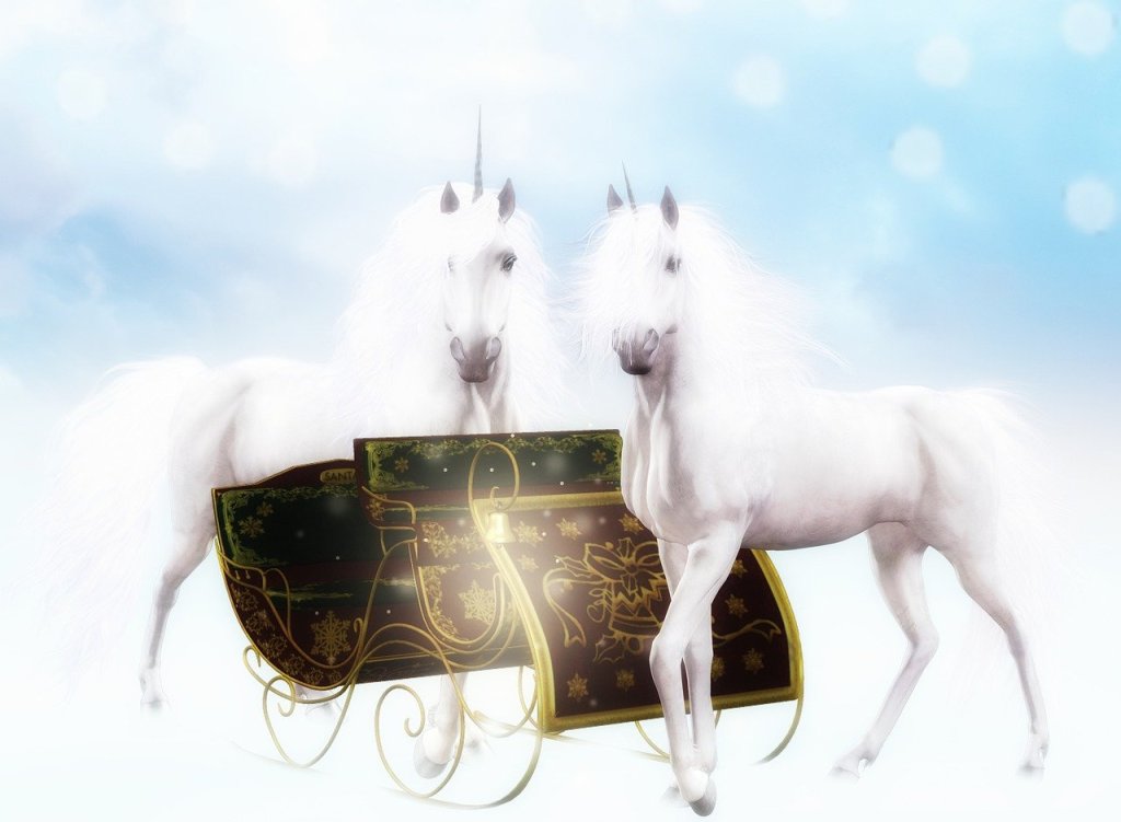 Two white unicorns with a black and gold sleigh with a design of bells and snowflakes